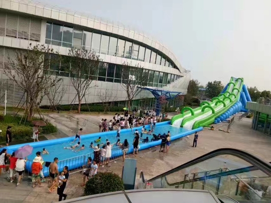Glissière de piscine commerciale Glissière gonflable géante City Parc d'attractions en plein air Glissières gonflables À vendre