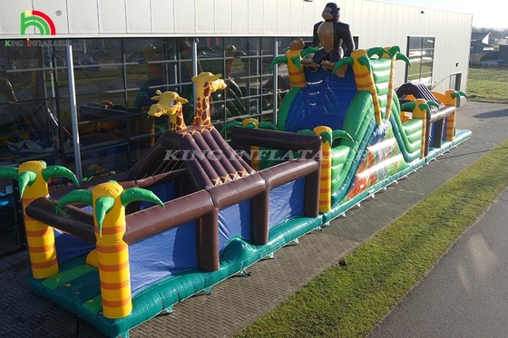 Grand parcours d'obstacles gonflable en plein air avec toboggan et clôture saut de rebond Jeu de sport avec trampoline et toboggan