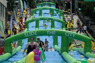 Longue glissière gonflable extérieure adaptée aux besoins du client de ville de jeu de sports aquatiques de 100m pour des adultes